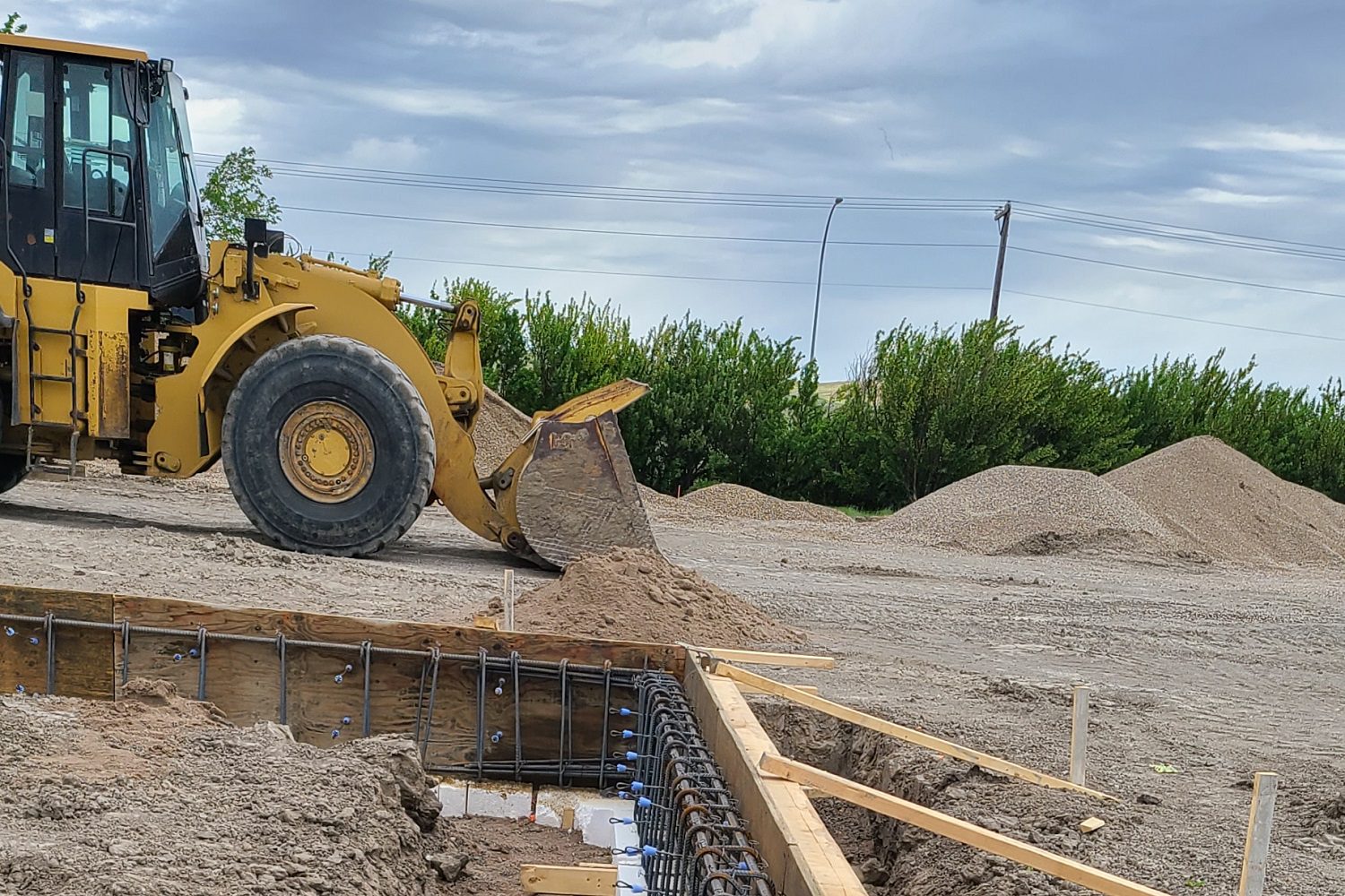 Front end loader on job site